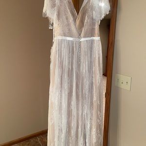 New with tags. Wedding dress brand new! I bought another one.